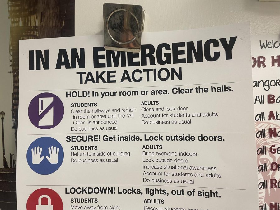 Image shows a sign detailing BHS emergency procedures. 